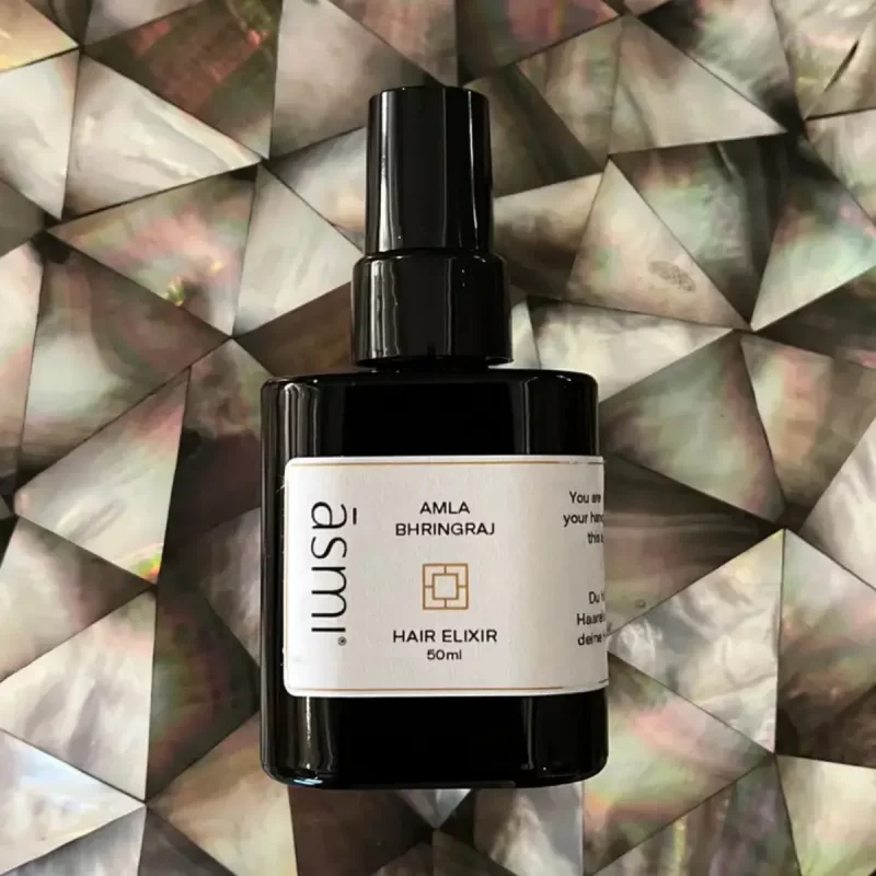 Asmi Ayurveda Hair Elixir med amla och bhringraj i svart flaska